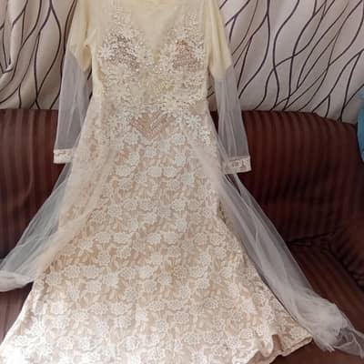 beautiful fancy dress available for sale .