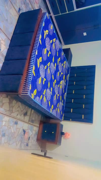Double bed with side table and matress
