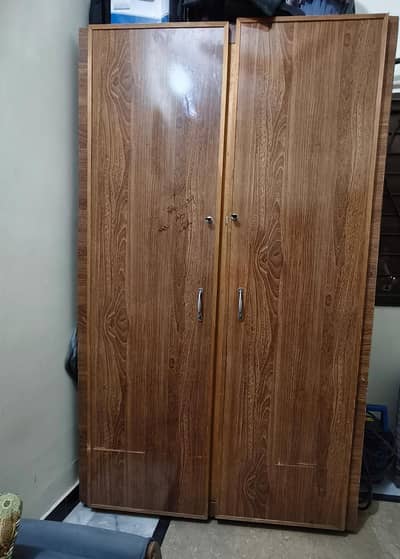 2 Door wooden wardrobe for sale.