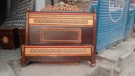 king bed with mattress and side table