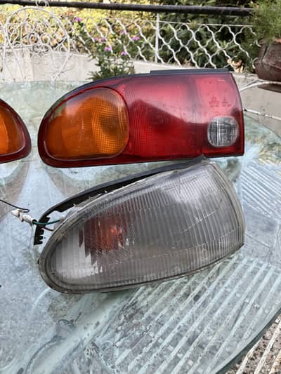 Lancer evo 3 front indicator taillights original and grill