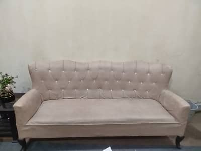 5 seater sofa, wooden frame, mazboot hai kafi but back side defected