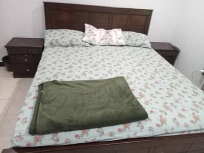 king sized bed with double foam mattress