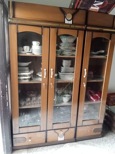 Almari with crockery dinner sets     new