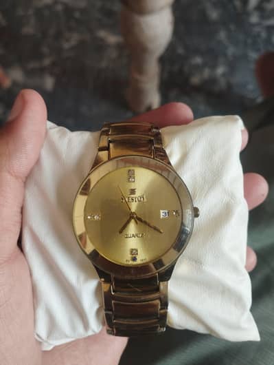 sveston golden watch