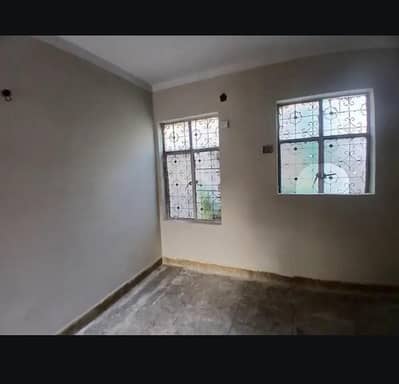 Neelum block allama iqbal town 5 marla uper centre portion for rent