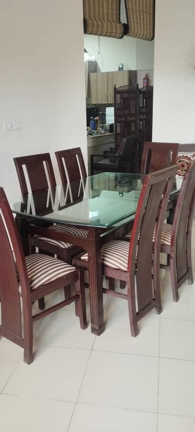Glass top dining table with 6 dining chairs