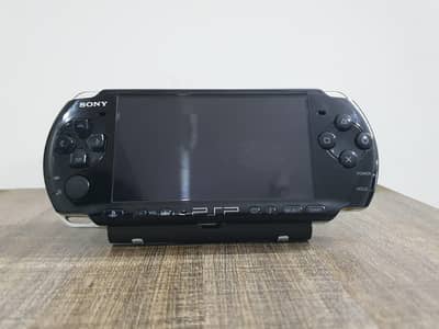Sony PSP 3000 – 1GB + Case + charger + 2 Games