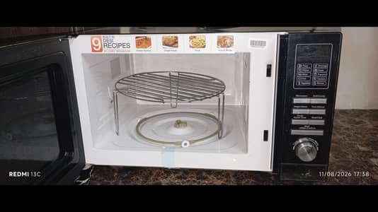 Dawlance Microwave Oven DW-128G Sleek Black Design with Digital Dis