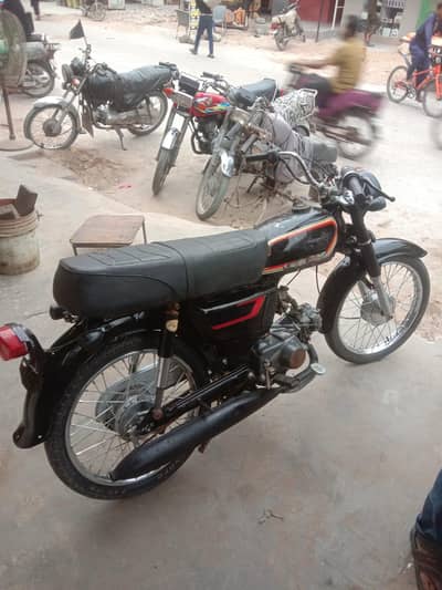 Honda 70cc 1977 Genuine Point Honda.