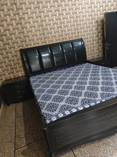 Bed with sides table