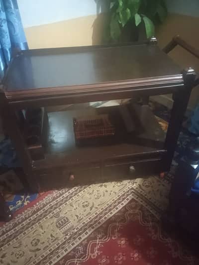tea trolley. rug. and microwave oven