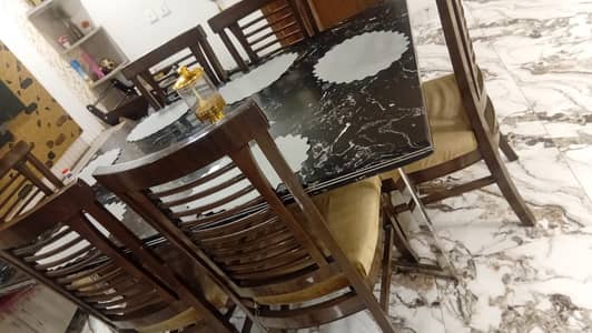 6 chairs and table with marbal
