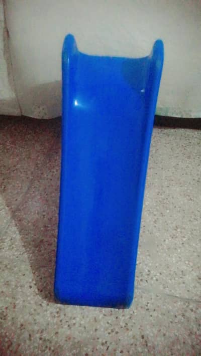 yellow and blue slide in good condition