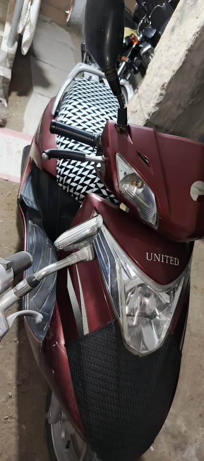 united petrol scooty