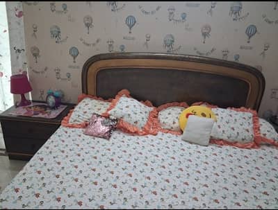 Bed with side tables