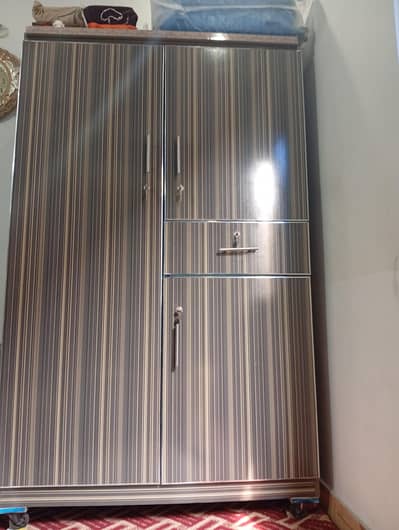 2-door wardrobe with drawer and hanging space