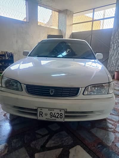 White color  Japani Corolla 2