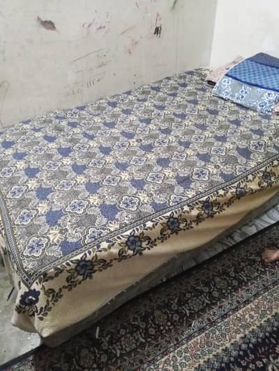 single bed with spring mattress