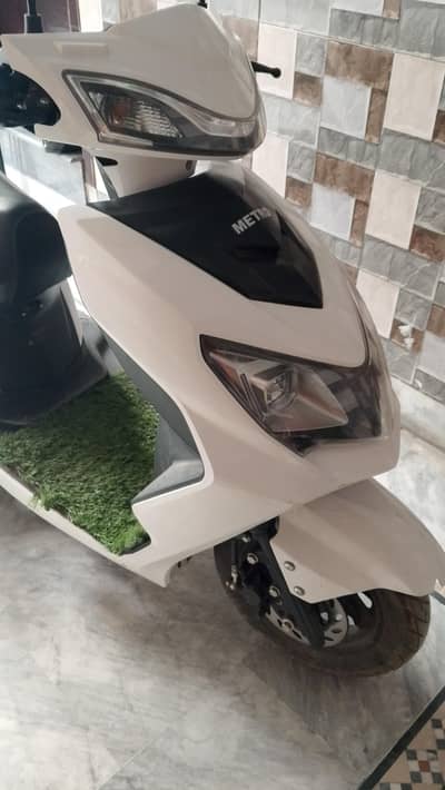 4 wheel scooter with warranty card