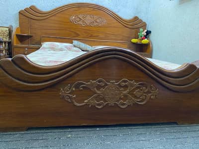 beautiful wooden bed set with side tables 