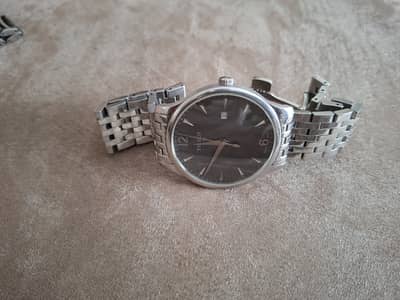 Tissot (Likely a Carson or Everytime variant) Sapphire Crystal