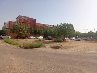 DHA Phase 7 Ext | Commercial Plot | 100 Sq. Yds. | Facing Kh. Aziz Bhatti | Khalid Commercial | Investor Grade Commercial Asset | Strong Future Appreciation