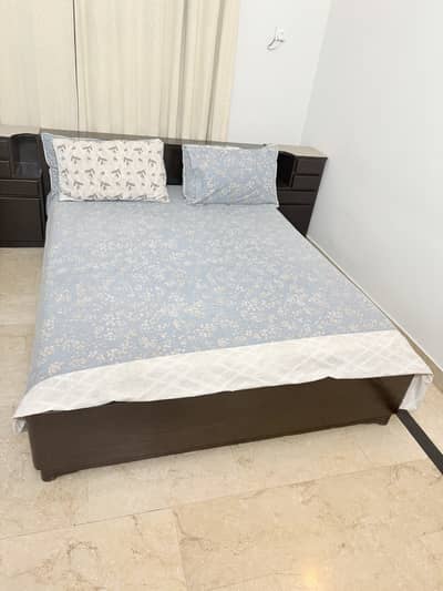 Queen size bed frame with side drawers for sale