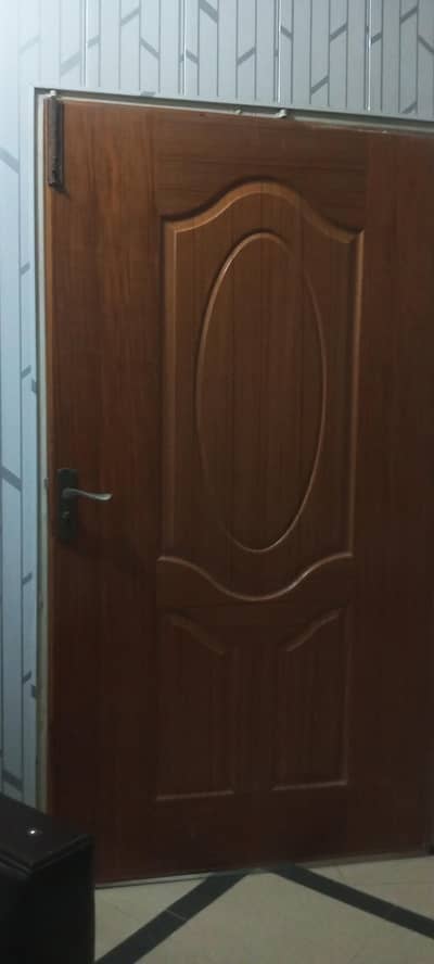 wooden doors, iron windows and iron gate
