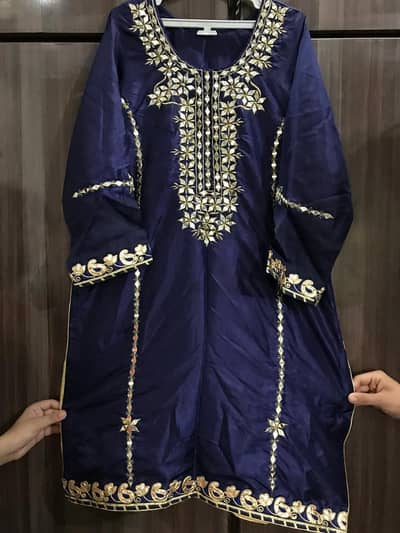 Silk shirt with embroidery and mirror work.