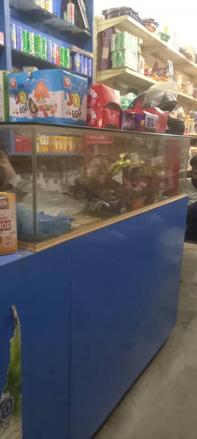 L-Shape wooden shop counter with wooden display racks for sale.