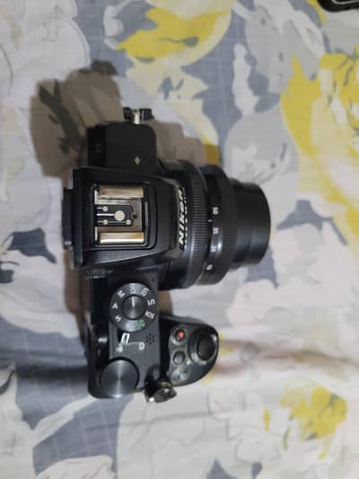 Nikon z50 with kit lens excellent condition low shutter