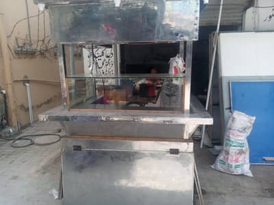 Wooden food cart with stainless steel sheet cover overed