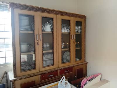 1 table with glass top 1 showcase for sale