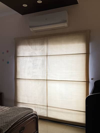 Selling used roman blinds for four windows. Double layered