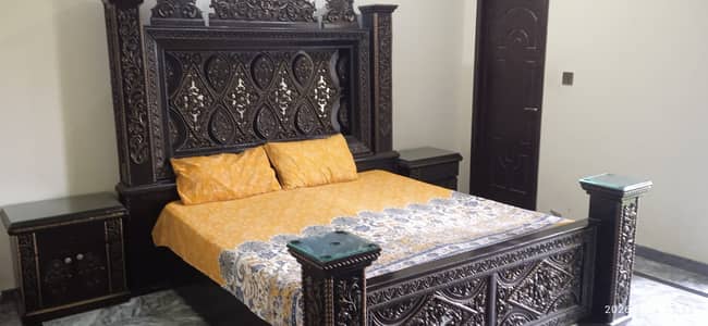 BED WITH SIDE TABLES, DRESSING, AND SHOWCASE