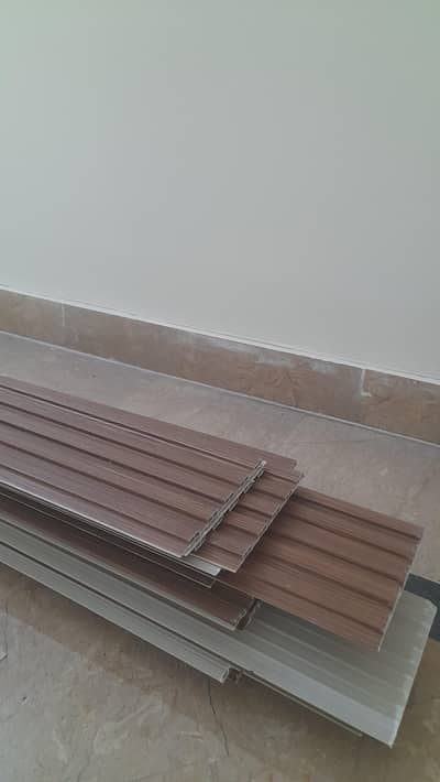 New PVC panels, wood color, lightly grooved