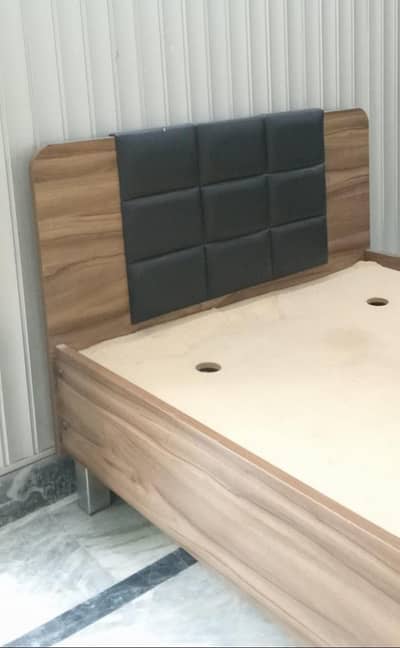 Single bed with side table