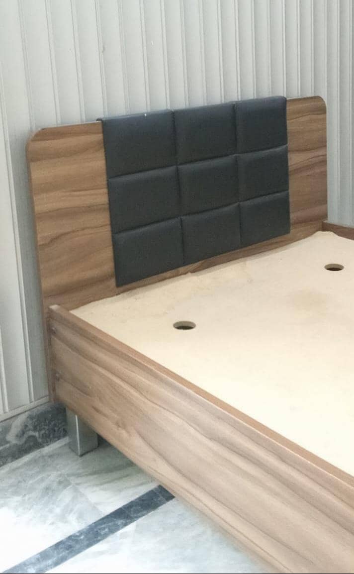 Single bed with side table 0