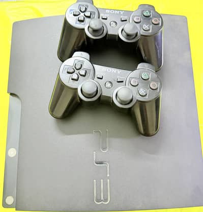 PS3 console with controllers