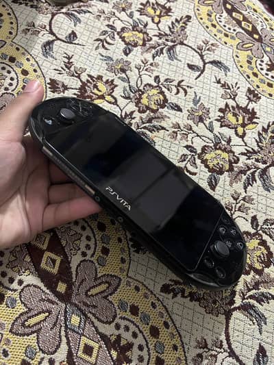 Sony PS Vita Console with Charger and Batman Game
