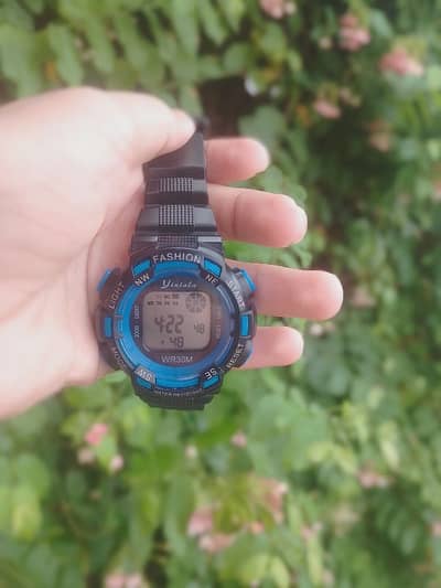 Title: Yixiala Digital Sports Watch WR30M – Black & Blue.