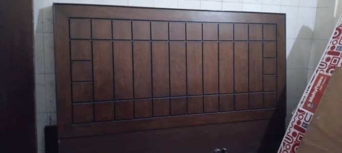 wooden double bed and double mirror dressing with two side tables.