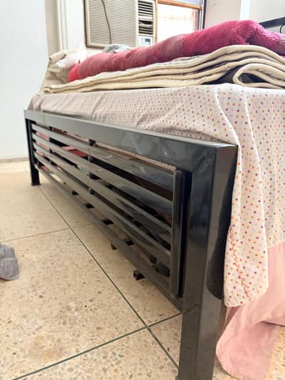 Iron bed with mattress