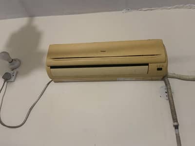Haier 1 ton bacha model with genuine pipe and fitting