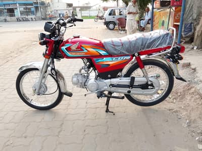 Honda CD 70 Model 2027 on the sport Red