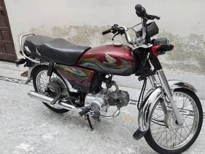 Honda cd 70 2023 model  Open letter