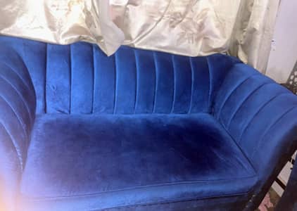 blue velvet sofa