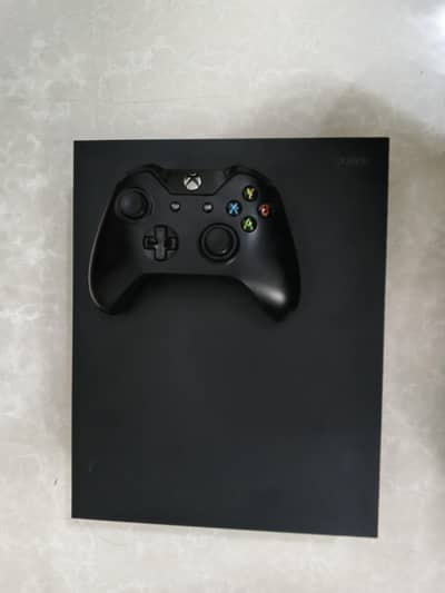 Xbox one x 1tb  with games installed