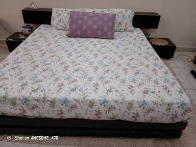 king size bed with side tables.